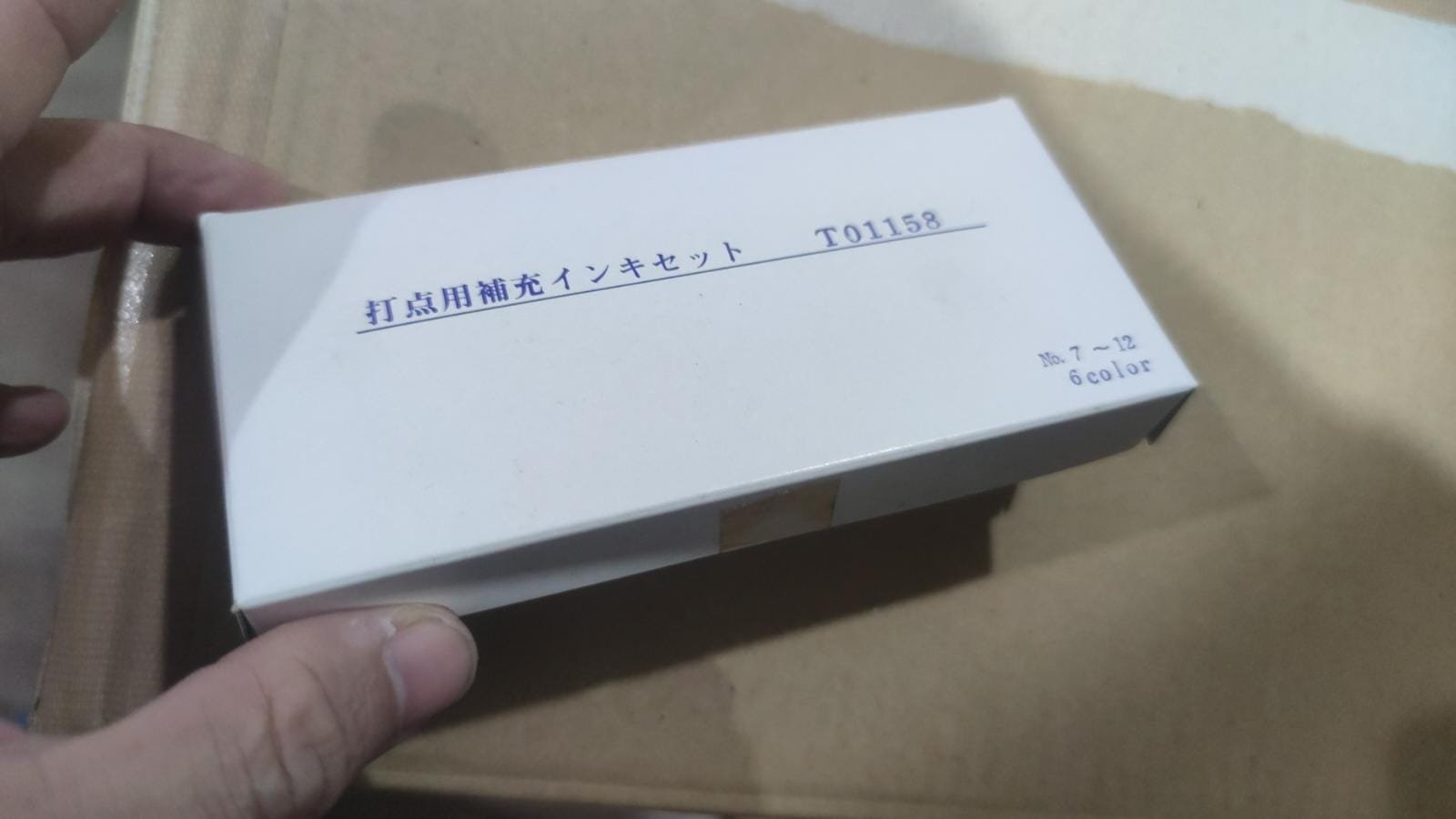 Sekonic T01158 filler ink box with six bottles numbered 7 to 12